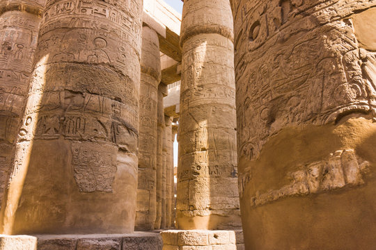 massive columns. Luxor, Egypt. old egypt hieroglyphs carved on t