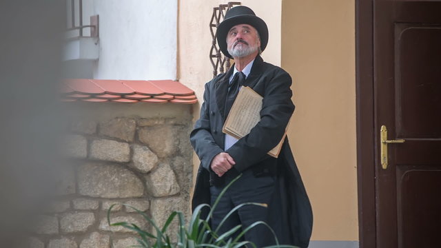 Man from modern times walk in the garden 