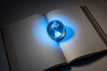 globe and open book