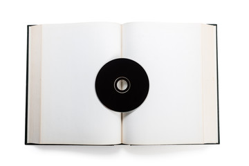 Fototapeta premium open book and compact disk