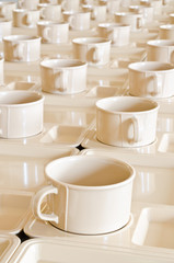 Group of coffee cups on plates
