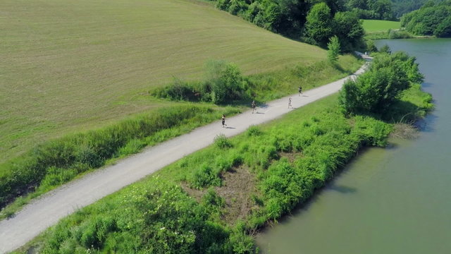 People jogging around the lake
