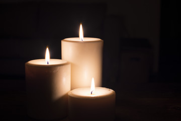 Fototapeta na wymiar Three Pillar Candles