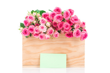 Roses in the box and a greeting card