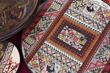 A handcraft plate as peruvian souvenir selling in the market