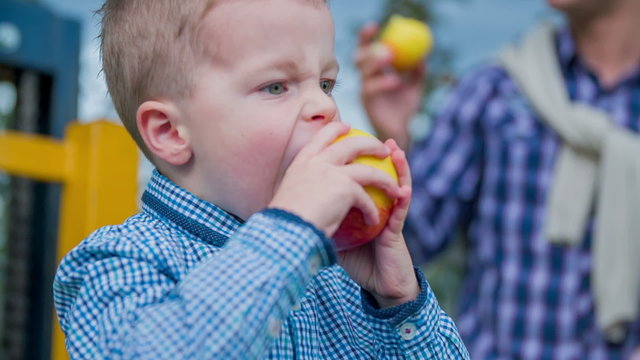Taking a bite from a frash apple 