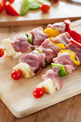 barbecue with pork,vegetable before grill on wooden board