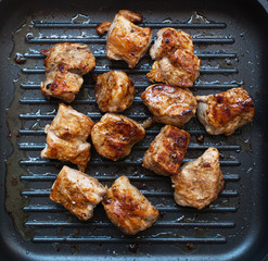grilled pork on pan