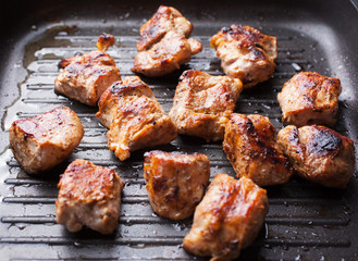 grilled pork on pan