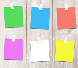 Colored six paper sheets on adhesive tape with copy space for text, for notes and reminders.