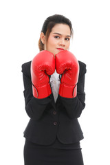 Asian business woman with boxing gloves isolated on white backgr