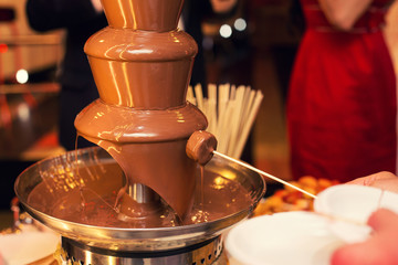 the chocolate fountain on a holiday table