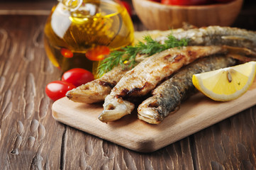 Traditional russian fish smelt on the wooden table