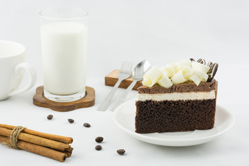 Tasty fresh croissants bread with milk and cake for breakfast