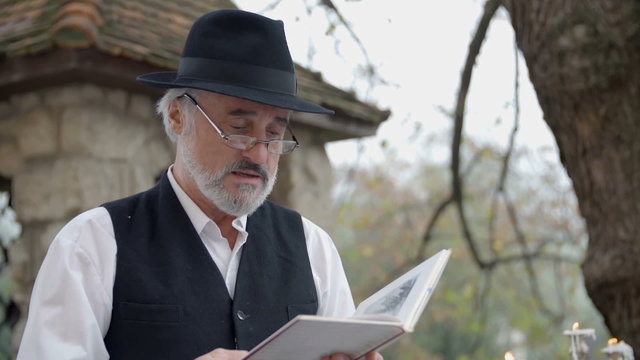 Man reading a poem out-laud 
