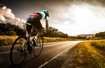 Foto op Plexiglas  Men cycling road bike in the morning © torwaiphoto