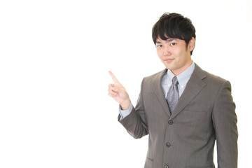 指示する笑顔のビジネスマン