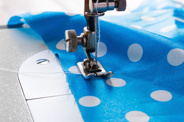 sewing machine and blue fabric