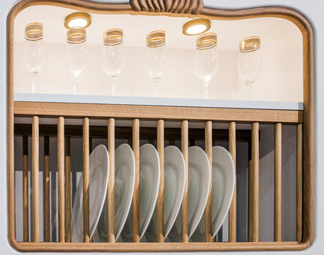 Plate and bowl rack in a cottage kitchen