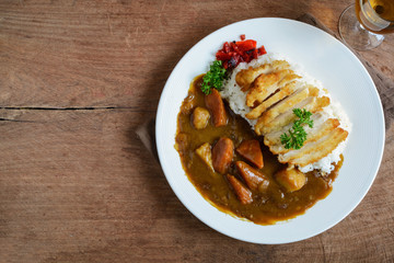 Tonkatsu, Japanese deep-fried pork cutlet on top with curry