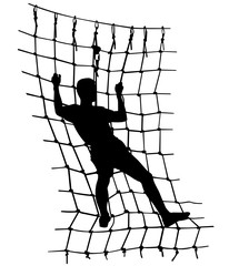 boy in adventure park rope ladder