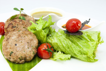 vegetarian meatballs with salad on a white background in restaurant