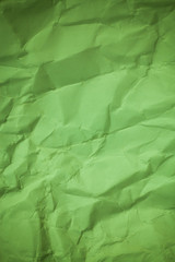 Paper background, Crumpled green paper texture.