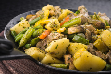 fried potatoes with vegetables