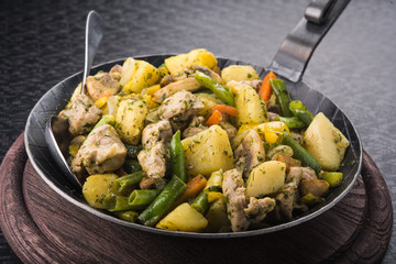 fried potatoes with vegetables