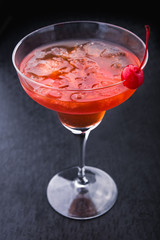 alcoholic cocktail with cherry