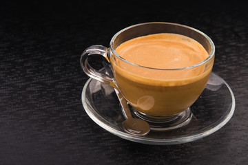White cup of espresso coffee
