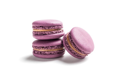 Purple macaroons on a white background