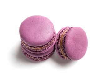 Violet macaroons on a white background