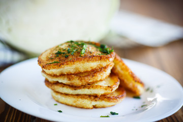 Vegetable fritters with cabbage and dill 