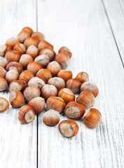 hazelnuts on a wooden table