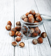 organic whole hazelnuts in a glass jar