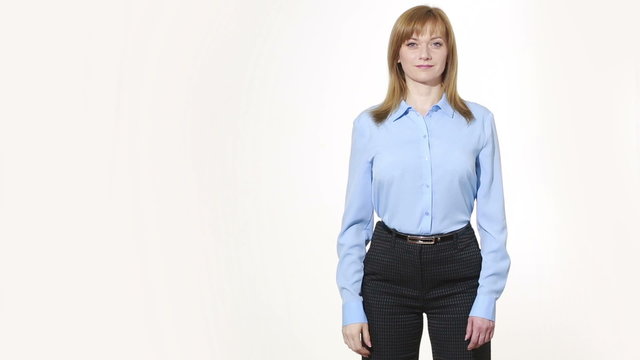 OK gesture. girl in pants and blous.  Isolated on white background. body language. women gestures. nonverbal cues