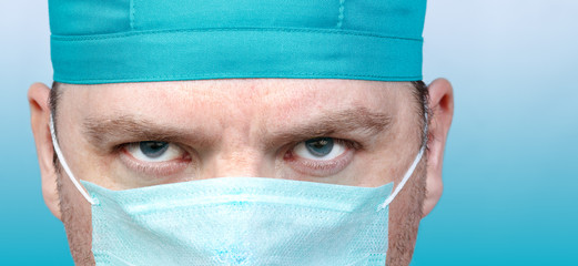 Male doctor face close up