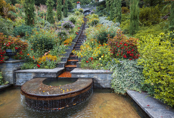 flower decorative water stairs in  late summer park