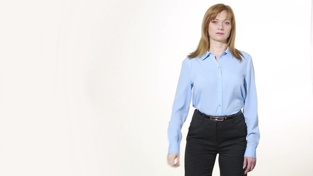 finger in mouth. excitement and regret. girl in pants and blous.  Isolated on white background. body language. women gestures. nonverbal cues