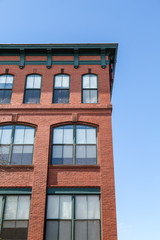 Obraz premium REd Brick Building with Green Trim