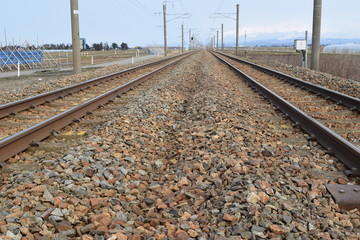 Fototapeta premium 羽越本線の線路（複線）／山形県の庄内地方で羽越本線の線路（複線）を撮影した、ローカルイメージの写真です。