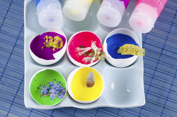Easter decoration with egg shells and filled with tempera paints