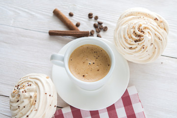 White cup of espresso coffee