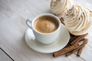 White cup of espresso coffee