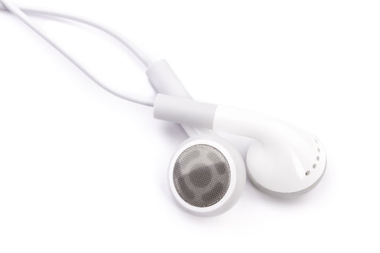 white earphones isolated on a white background 