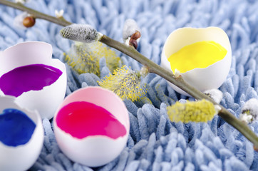 Yellow pad and Easter decoration with egg shells and hellebore plus tempera paint