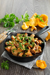 Fried chanterelle mushrooms in a creamy sauce