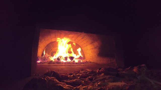 UHD. Burning Red Fire in Pizza Oven 