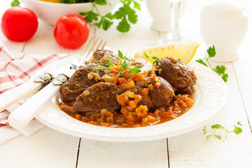 ossobuco with polenta on the Milanese. Italian Cuisine.